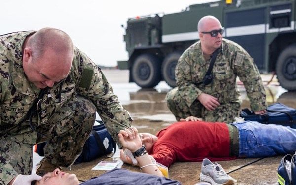 during a mass casualty drill military medics perform triage on multiple patients